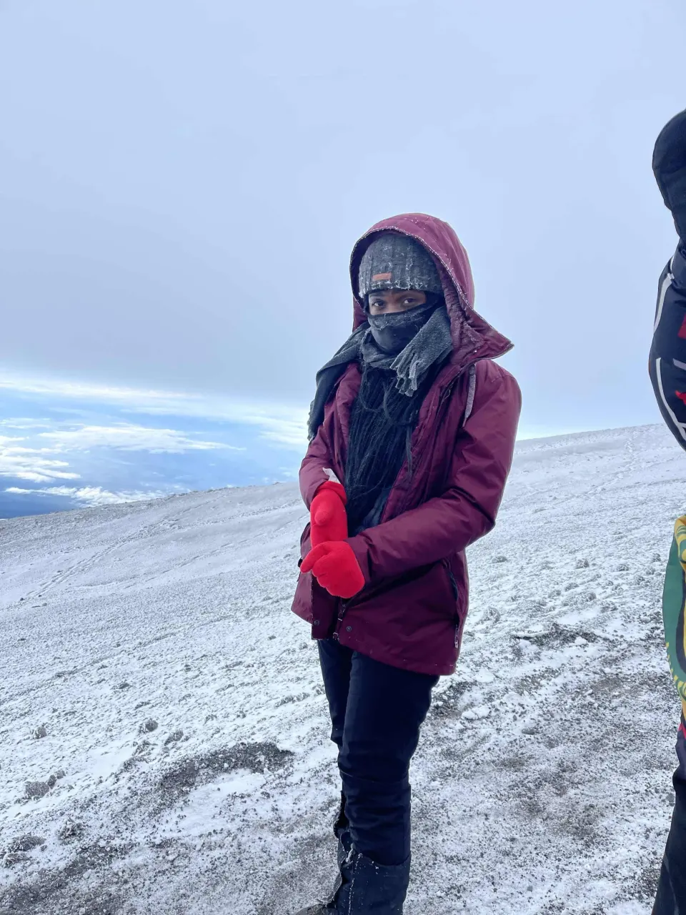 Fatoumata Doro at the snowy summit of Kilimanjaro